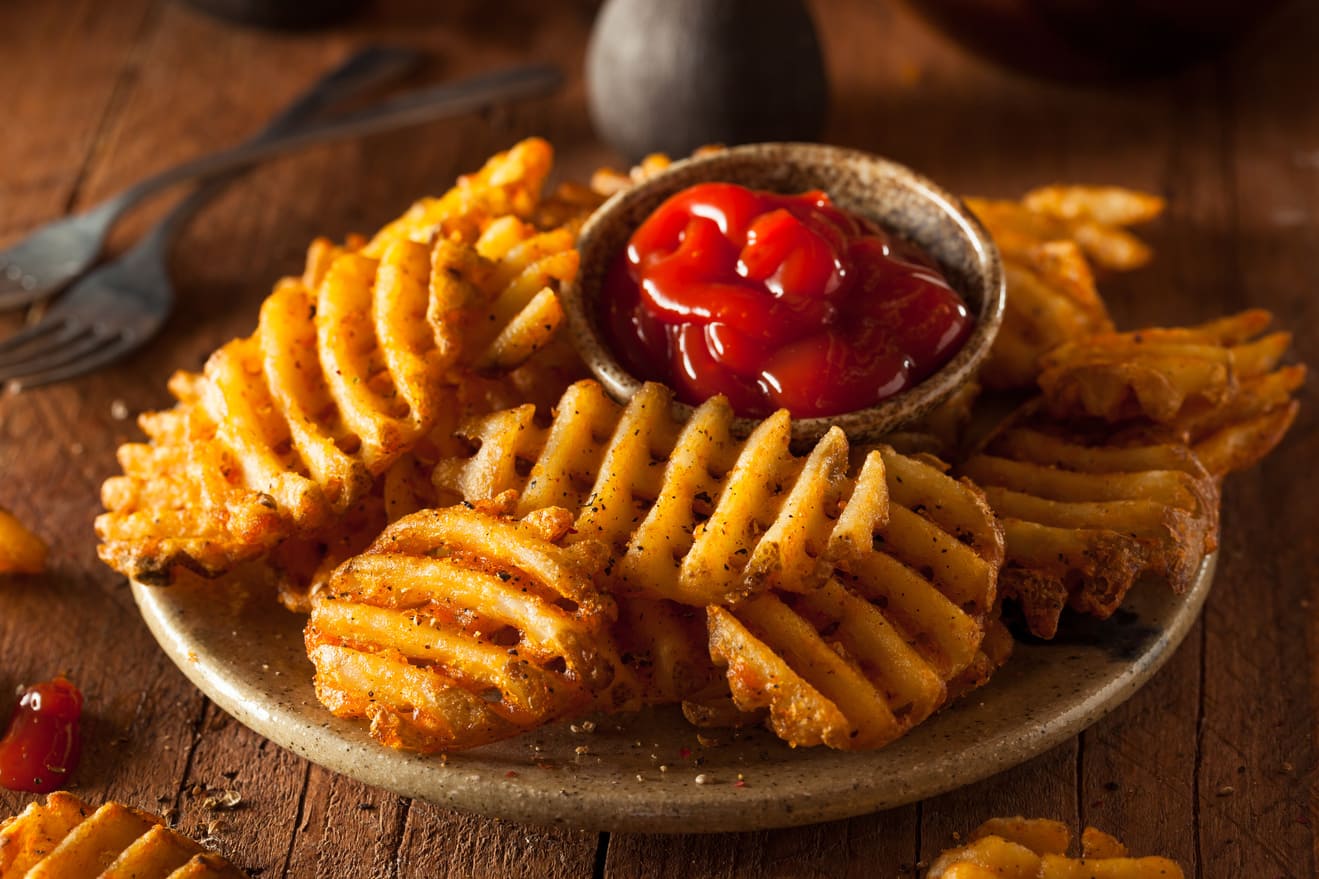 Exquisitas papas waffle con un sabor ligeramente picosito, condimentadas con un poco de paprica y sal, simplemente te encantaran.  